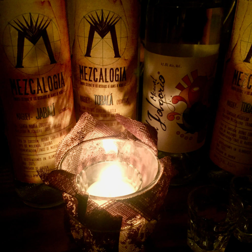 Mezcal bottles at Mezcalogia