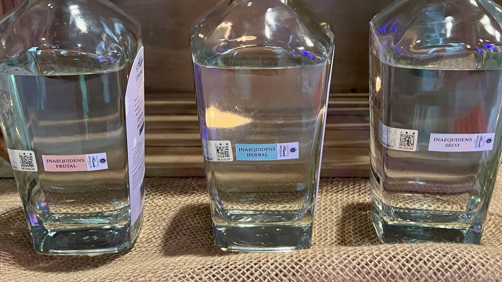 A flight of three bottles of Oponguio Mezcal 